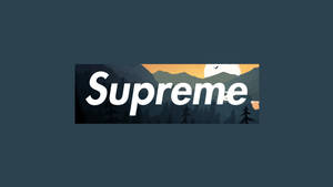 A Supreme Laptop With A Majestic Mountain Wallpaper Wallpaper