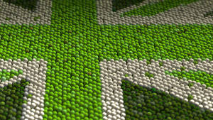 A Tennis Ball Adorned With The British Flag Amid Wimbledon Championship Wallpaper