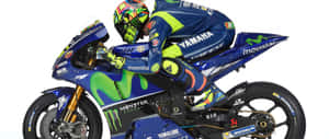 A Thrilling Ride With The Vr46 Yamaha Monster Energy Motorcycle Wallpaper