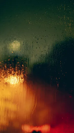 A Tranquil Scene Of A Beach Sunset With A Calm Ocean In The Background. Wallpaper