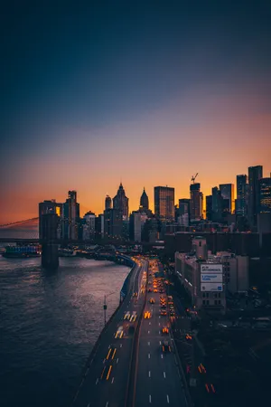 A Tranquil View Of The Skyline At Dusk Wallpaper