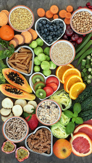 A Variety Of Fruits And Vegetables In A Bowl Wallpaper