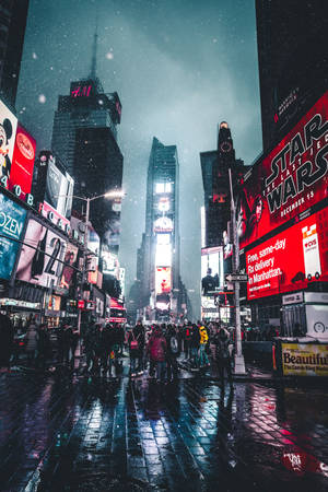 A Vibrant Display Of City Night In Time Square Wallpaper