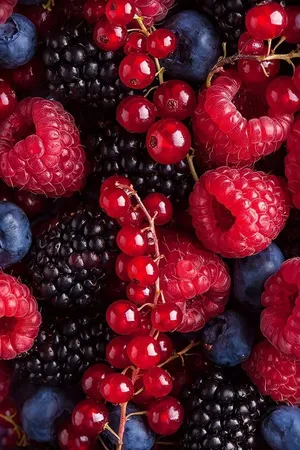 A Vibrant Mix Of Boysenberry, Cherries And Raspberries Wallpaper