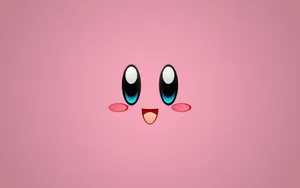 A Vibrant Pink-colored Kirby Looks Happy And Friendly, Inviting Us To Join The Adventure. Wallpaper