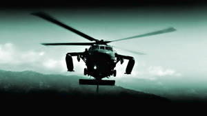 A View Of A U.s. Army Black Hawk Helicopter In Action Wallpaper