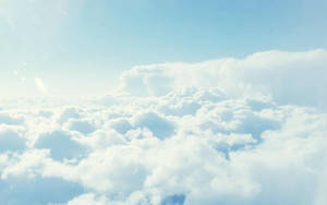 A View Of Clouds From An Airplane Wallpaper