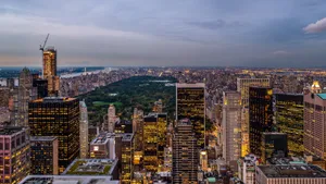 A View Of The City From The Top Of A Building Wallpaper