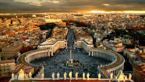 A View Of The City Of Rome From The Top Of A Hill Wallpaper