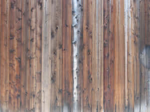 A View Of Weathered Barn Wood Planks Wallpaper