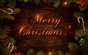 A Warm, Inviting Merry Christmas Postcard Radiating Holiday Spirit. Wallpaper