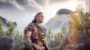 A Woman In Armor Standing In Front Of A Mountain Wallpaper