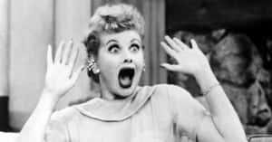 A Woman Is Holding Her Hands Up In The Air Wallpaper