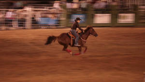 A Woman Riding A Horse Wallpaper