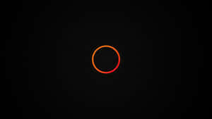 Abstract Orange Circleon Black Background Wallpaper