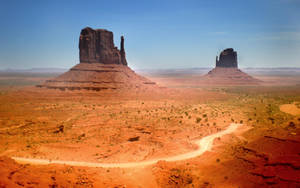 Achingly Beautiful Black Mountain Rocks At Monument Valley Wallpaper