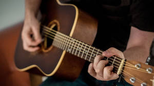 Acoustic Guitar Dark Brown Wallpaper