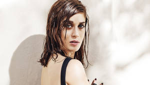 Actress Lizzy Caplan Flaunting Her Wet Look Style Outdoors Wallpaper