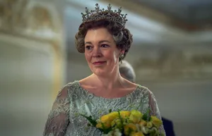 Actress Olivia Colman Lighting Up The Scene Wallpaper