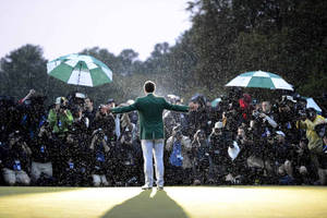 Adam Scott Posing Under The Rain Wallpaper