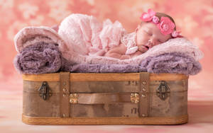 Adorable Baby Girl Sleeping Peacefully Wallpaper