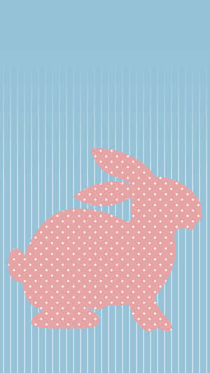 Adorable Pink Bunny Hopping Through A Grassy Meadow Wallpaper