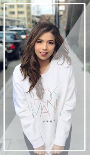 Adorable Pokimane Tongue Out Wallpaper