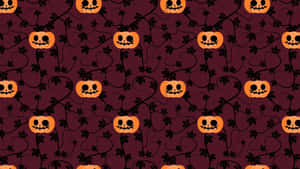 Adorable Smiling Jack-o'-lantern In A Fall Harvest Scene Wallpaper