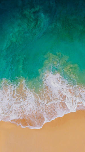 Aerial Shot Of Ocean Waves Ios 7 Wallpaper