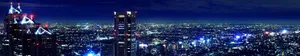 Aerial View Of A City At Night Wallpaper