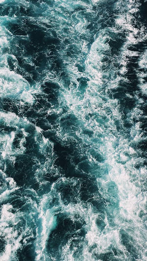 Aerial View Of A Rough Sea Wallpaper