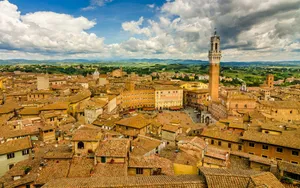 Aerial View Of Brick Houses In Siena Wallpaper