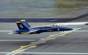 Aerial View Of The Blue Angels Jet Team In Formation Wallpaper