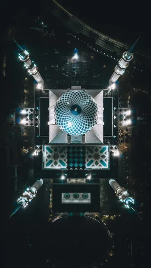 Aerial Viewof Mosqueat Night Wallpaper