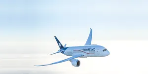 Aeromexico Airline Plane Flying In Clear Sky Wallpaper