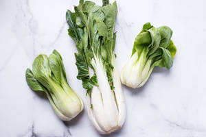 Aesthetic Bok Choy Cabbages On Marble Wallpaper