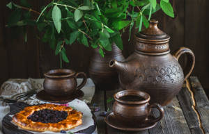 Aesthetic Bronze Tea Set Wallpaper