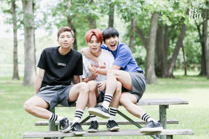 Aesthetic Bts Trio On Park Bench Wallpaper