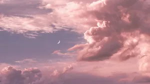 Aesthetic Clouds And Distant Crescent Moon Wallpaper