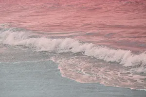 Aesthetic Ocean With Pink Water Wallpaper