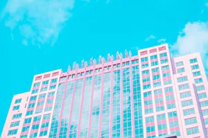 Aesthetic Pink Building With Sparkling Lights Wallpaper