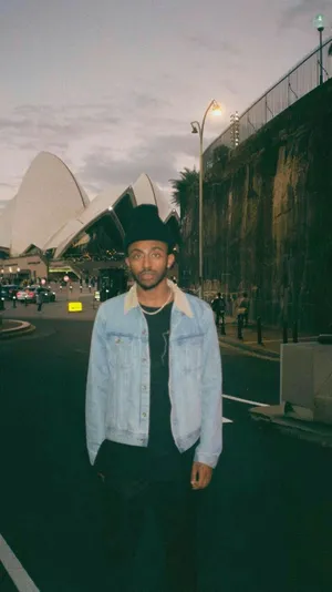 Aesthetic Rapper Poised For A Performance Wallpaper