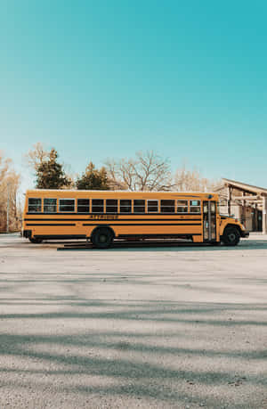 Aesthetic School Bus Long Shot Portrait Wallpaper