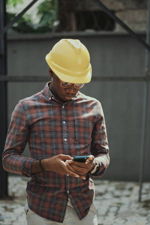 African Man In Plaid Shirt Wallpaper