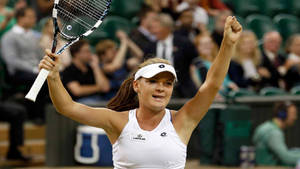 Agnieszka Radwanska Arms Up In Celebration Wallpaper