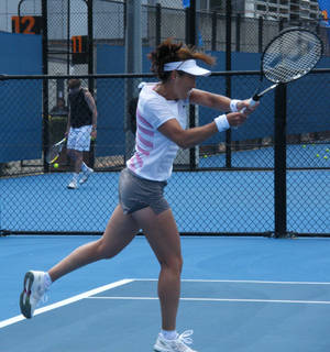 Ai Sugiyama Practicing At A Tennis Training Facility. Wallpaper