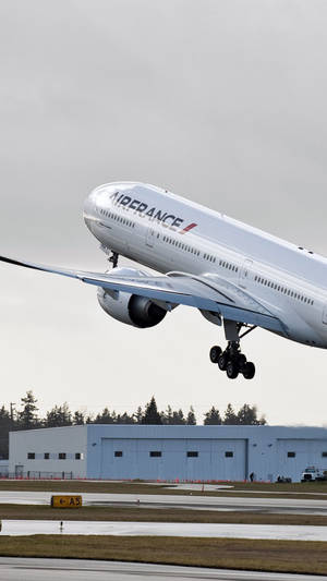 Air France Airline Boeing 777 Plane Above Ground Wallpaper