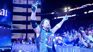 Aj Styles Triumphing At Wrestlemania 33 Event Wallpaper