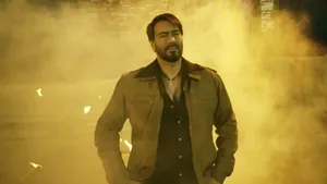 Ajay Devgn In Brown Jacket Outfit Wallpaper