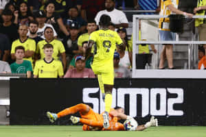 Ake Loba Evading Goalkeeper Challenge Wallpaper